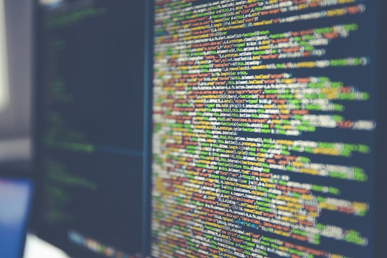 JSON news feed format — colorful code on a computer monitor