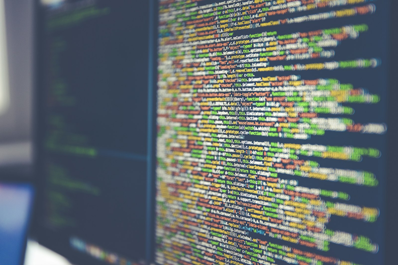 JSON news feed format — colorful code on a computer monitor