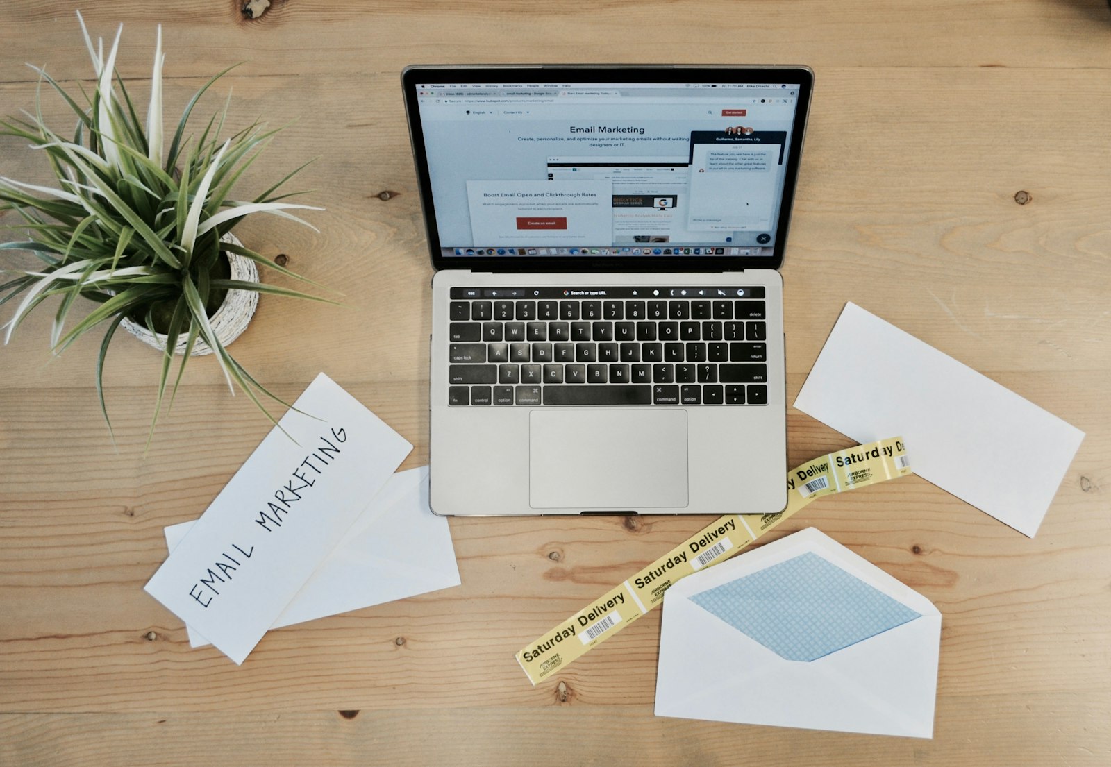 RSS to newsletter automation workflow with laptop and email marketing plan